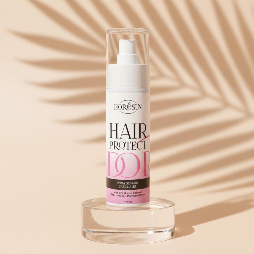 Spray solaire capillaire Dorésun qui protège les cheveux du soleil, du sel et du chlore. Anti-frisottis, sans rinçage, brillance naturelle.
